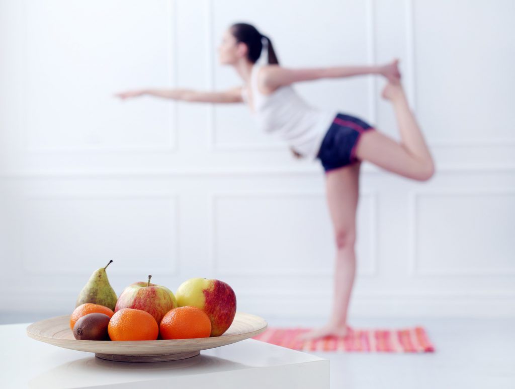 Lifestyle. Cute, attractive woman during yoga exercise